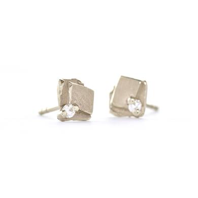 Playful square ear studs with diamond