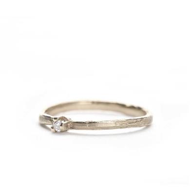 Fine ring with diamond and subtle structure