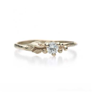 ring met blaadje en diamant in goud