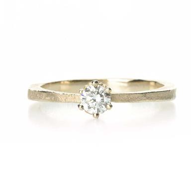 Bague Solitair avec sertissage classique